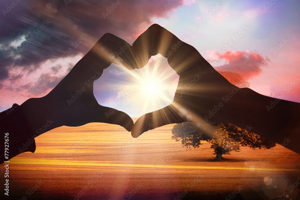 Aufkleber composite image of couple making heart shape with hands