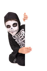 Boy in Halloween skeleton costume