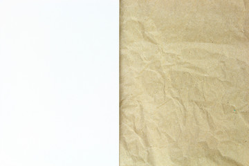 Old crumpled paper and white blank papper on top background