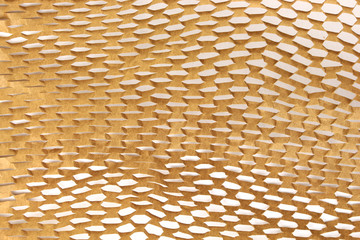 Recycled ruffled wrapping paper with holes, abstract background