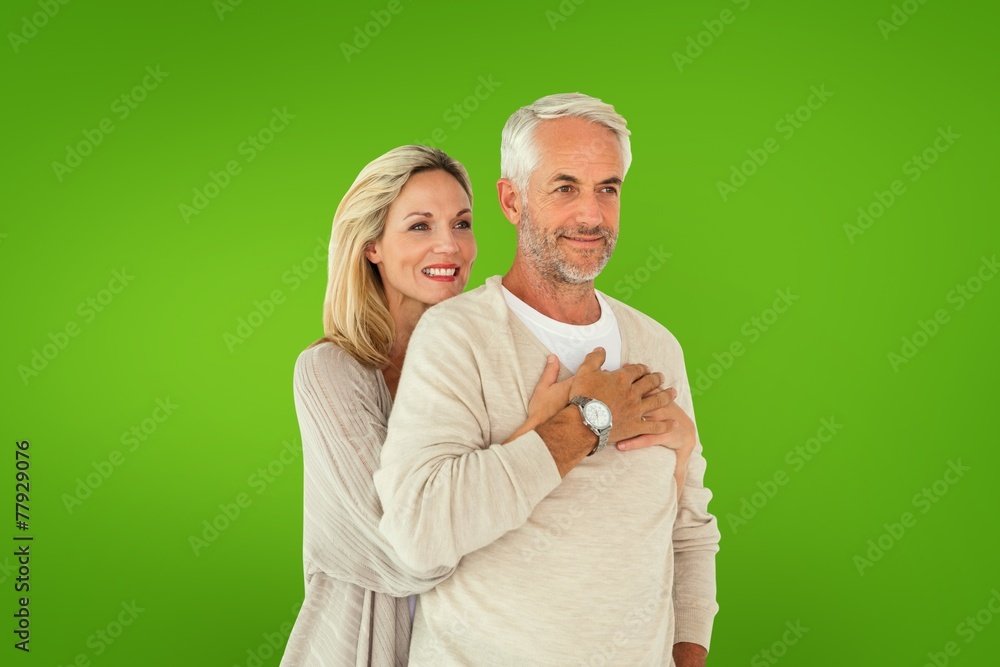 Aufkleber composite image of happy couple standing and hugging