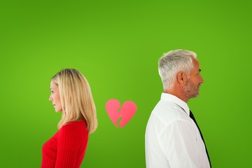 Couple not talking with broken heart between