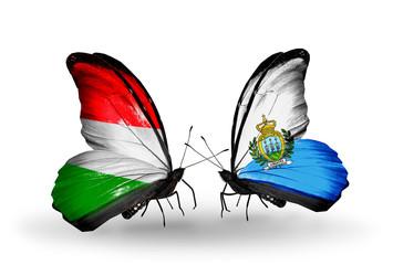 Two butterflies with flags Hungary and San Marino