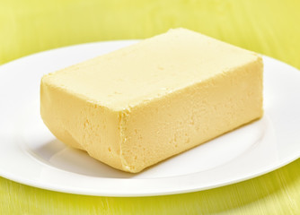 Butter on white plate