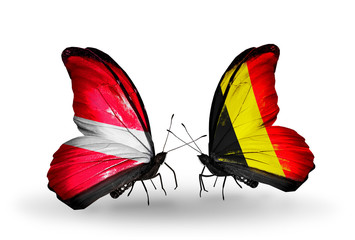 Two butterflies with flags Latvia and Belgium