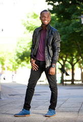 Smiling african american man in black leather jacket