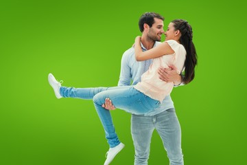 Composite image of attractive young couple having fun