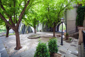 Small park near Segovia Viaduct on spring in the city of Madrid