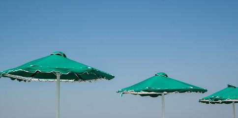 green umbrella on natural background