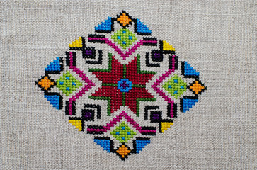 Ornament- ethnic Ukrainian embroidery on cannabic canvas