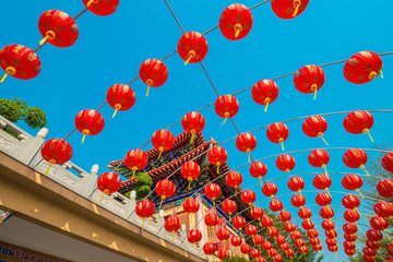 chinese red lanterns hanging in street for new year celebrating © themorningglory