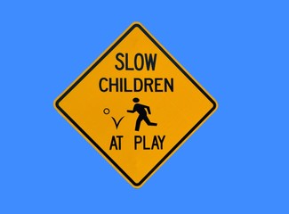 slow children at play road sign