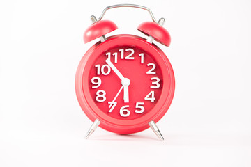 Red clock on white