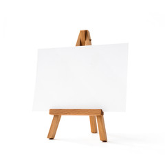 Small easel with white album sheet of paper