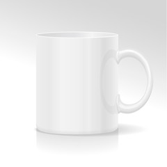White ceramic mug. Isolated on a white.