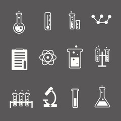 Set of white science and research icons on a grey background