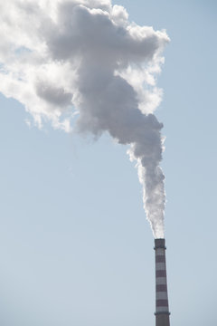 Factory chimney in winter