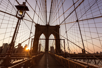 Brooklyn Bridge sunset with Manhattan skyline US