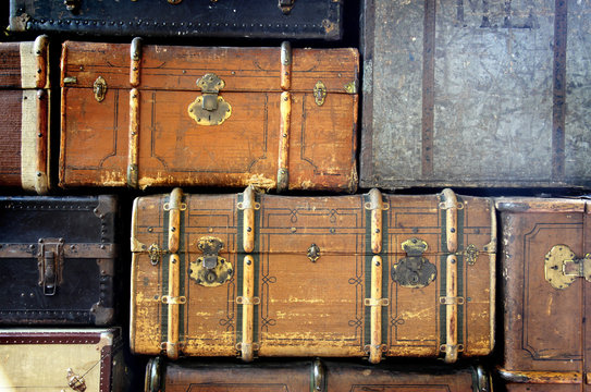 background with scratched antique suitcases