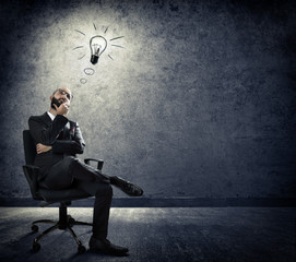 turn on idea - thinking of businessman