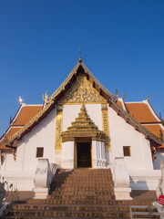 Church of Wat Phu Mintr under blue sky
