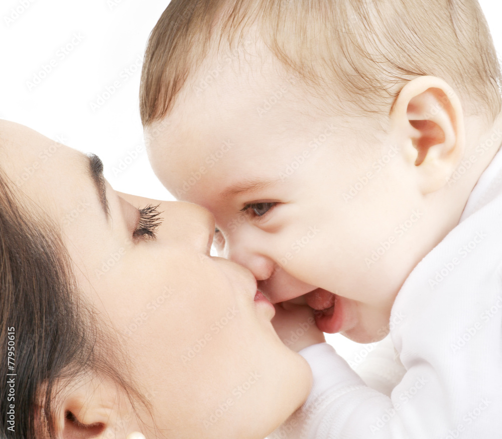 Wall mural mother kissing her baby