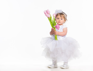 Little girl with flowers