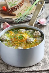 Soup with meatballs and vegetables.Selective focus.