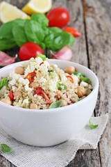 Quinoa salad with vegetables,chickpea and feta.Selective focus.
