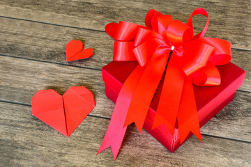 Red gift box and red heart shape