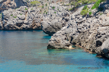 Fototapeta premium Rocky Mediterranean coast line at hot summer day