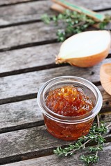 Homemade onion marmalade on a rustic  table.Selective focus.