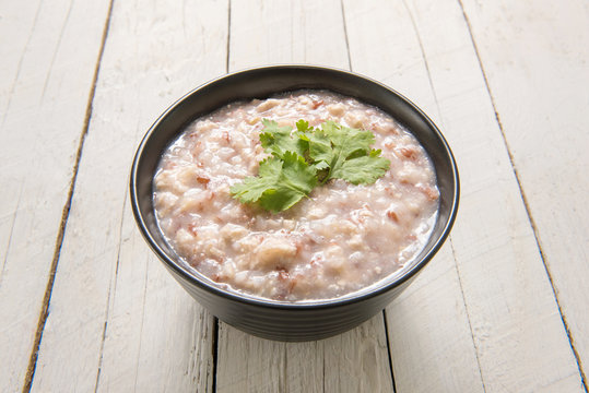Boiled rice with minced pork and vegetables