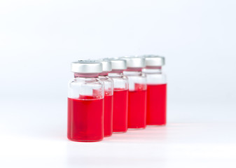 Red liquid in injection vials