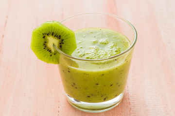 Healthy diet fruit juice kiwi wooden table