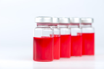 Red liquid in injection vials
