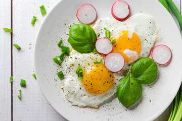 Fried eggs shape hearts Valentines dish