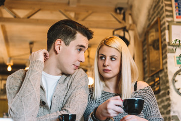 Young couple in cafe