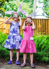 Girls Wearing Bunny Ears and Silly Egg Eyes