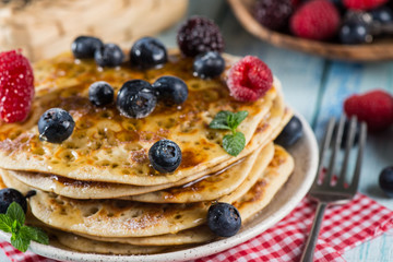 Delicious summer breakfast with fresh forest fruits