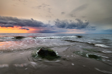 Beautiful colorful sunset over sea beach