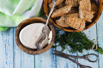 wholegrain bread with fresh dill and soft cheese