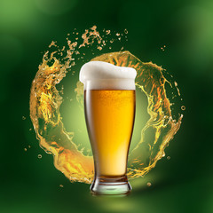 Beer in glass with splash on green background