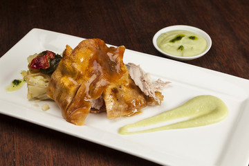 Roast pork with potatoes and apple sauce