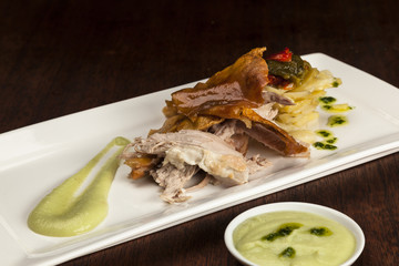 Roast pork with potatoes and apple sauce