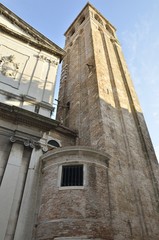 Fototapeta na wymiar Bell Tower of the Church of San Silvestro in Venice, Italy