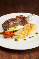 Grilled beef steak, Chuletón with potatoes