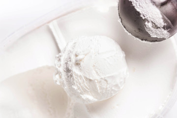 Vanilla ice cream scoop closeup. White  Ice Cream Background