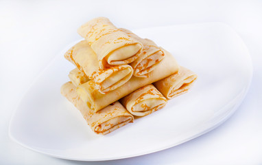 Delicious pancakes on a plate.