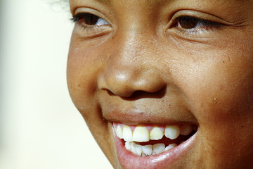 Smiling poor african girl, Madagascar